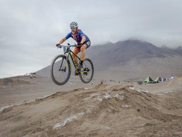 How can you prepare for a long-distance sport biking tour in the UK?